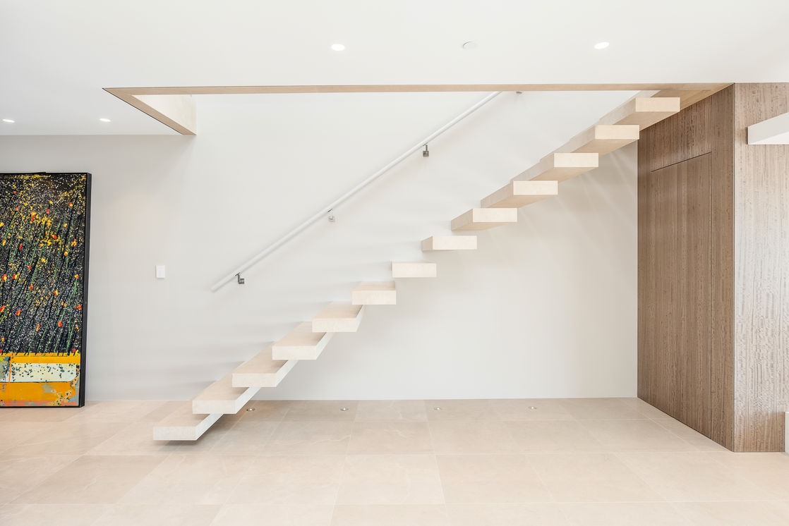 Floating Limestone Stairs to Upper Level